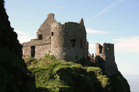 The comforting walls of home Dunluce Castle Northern Irelandの写真素材