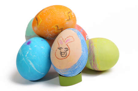 Child colored Easter Eggs on a white backgroundの写真素材