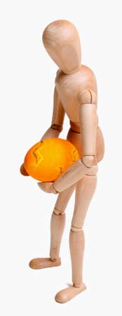Mannequin holding an easter egg standingの写真素材