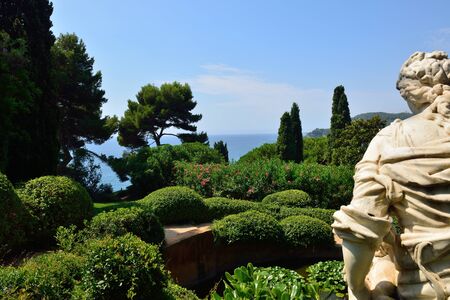 View of a beautiful botanical garden on the coast of mediterranean seaの写真素材