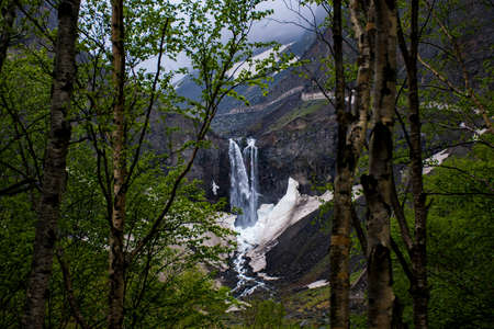 Waterfall in the mountainsの写真素材