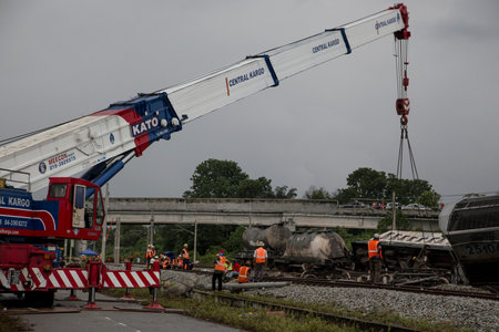 Crane carry out a damaged wagon from railway after Batu Gajah Train Accident on 28th Oct 2016 in...