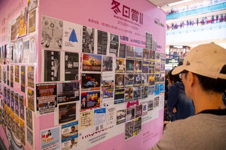 A man reads the info on a wall during a protest at New Town Plaza of Sha Tin in Hong Kongのeditorial素材