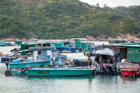 A view of Lamma Island with boats and shipyard in Hong Kongのeditorial素材