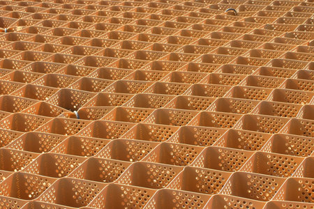 Net used to support the soil near the side of the road の写真素材