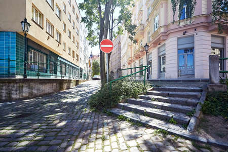 empty street in old city of Prague with stone path a stairs with no entry. One way road.の写真素材