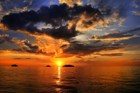 Sea landscape with a sunset and the cloudy sky. Siam Bay.Thailand