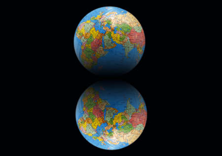 Earth on a black background with mirrorの写真素材