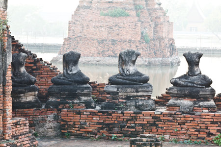 Buddha statues and Floods Chaiwatthanaram Temple at Ayutthaya, Thailandの写真素材