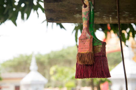 old two color burshs and temple backgroundの写真素材