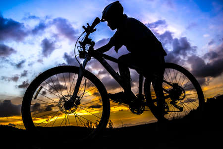 silhouette  Bicycle in sunset (beautiful sky)の写真素材