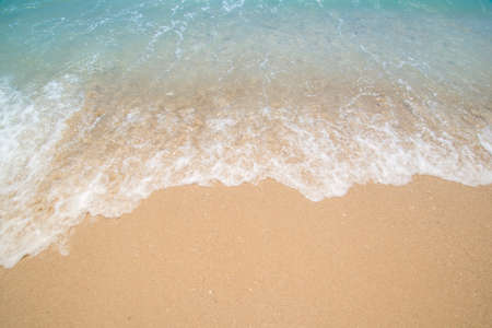 sand and sea (beach and blue water)の写真素材