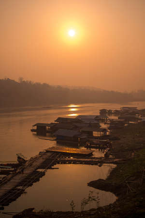 Village near river at sangklaburi, Kanchanaburi,Thailand.の写真素材