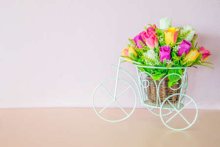 Cream color bicycle flower pot.の写真素材