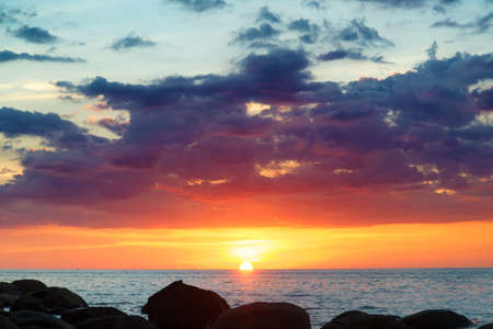 beautiful sunset reflect on sea and pattern coastの写真素材