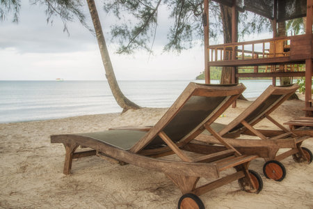 wooden chair for relaxe at beach in Thailandの写真素材