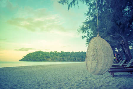 wooden and robe cradle at sea for relaxの写真素材