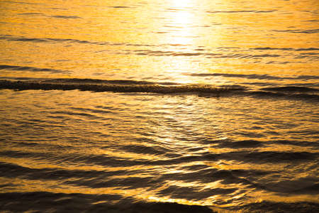 Golden sea texture, Golden wave texture background.の写真素材