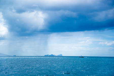 fighting boat go into storm on sea.の写真素材