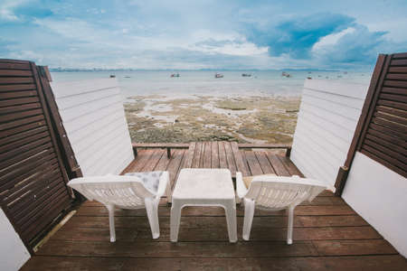 seaview chair to see beach and seaの写真素材