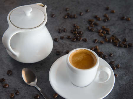 hot espresso coffee and coffee bean on loft tableの写真素材