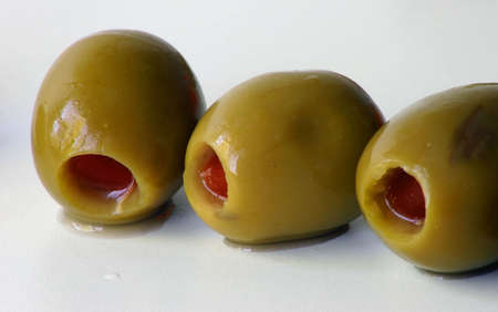 Closed-up of Three Stuffed Green Olivesの写真素材