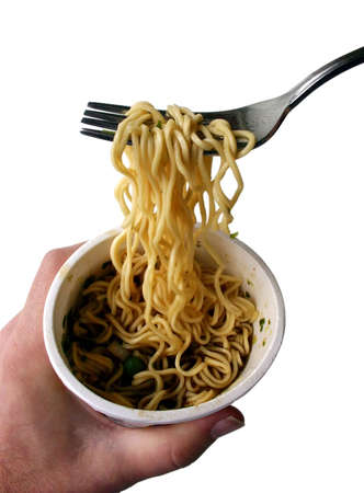 Eating Noodles from a Styrofoam Cupの写真素材
