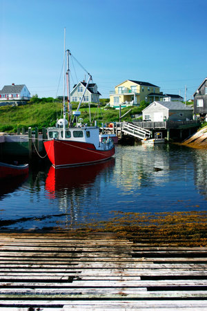 Fishing Village Under a Blue Skyの写真素材