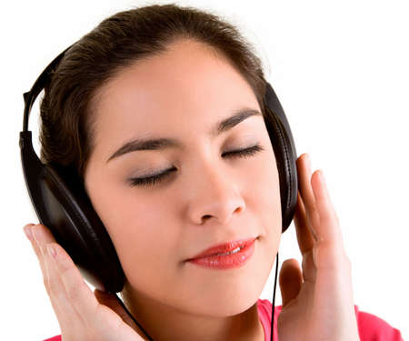Beautiful Young Woman Listening to Musicの写真素材