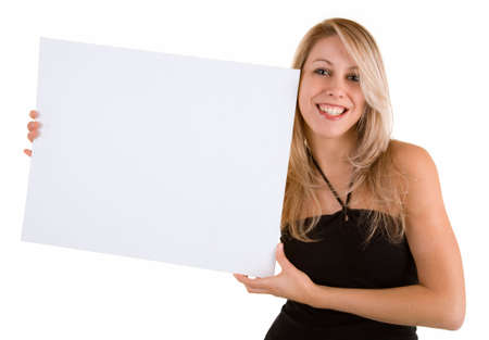 Beautiful young woman holding a blank white signの写真素材