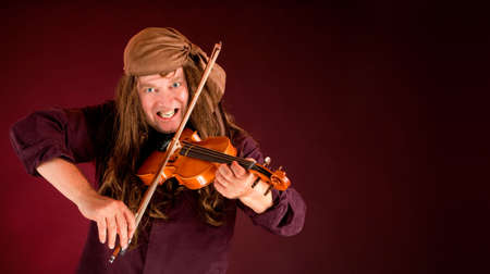 Pirate Playing Violin and Announcing Something の写真素材
