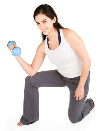 Young Woman Lifting Weightsの写真素材