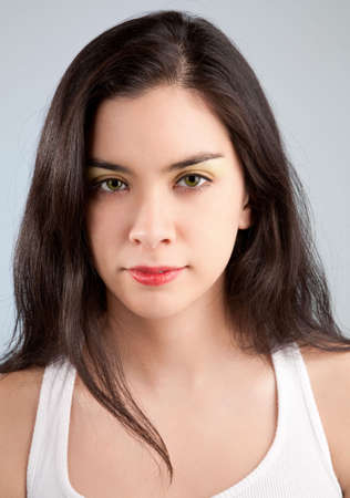Portrait of a Beautiful and Serious Young Womanの写真素材