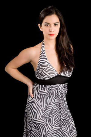 Beautiful Brunette Lady Posing in a Black and White Dressの写真素材