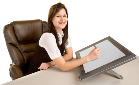 Woman Drawing on Digital Tabletの写真素材