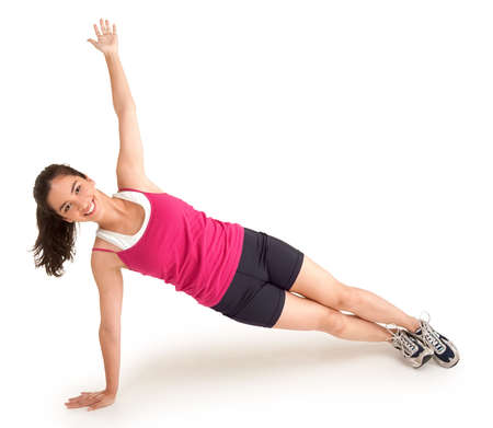 Beautiful Young Woman Exercisingの写真素材