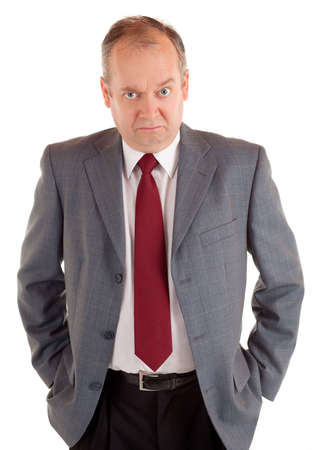 Serious Businessman with a Scowling Expressionの写真素材