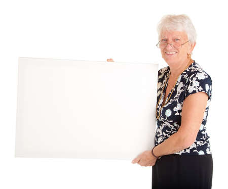Senior Businesswoman Holding a Blank White Sign.の写真素材