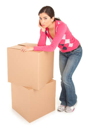 Tired Woman Leaning on Boxesの写真素材