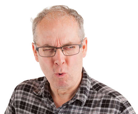 Man has an unconvinced and skeptical attitude.の写真素材