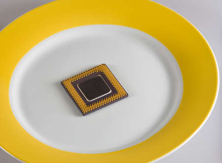 Concept. To serve cold: CPU on the gold plateの写真素材