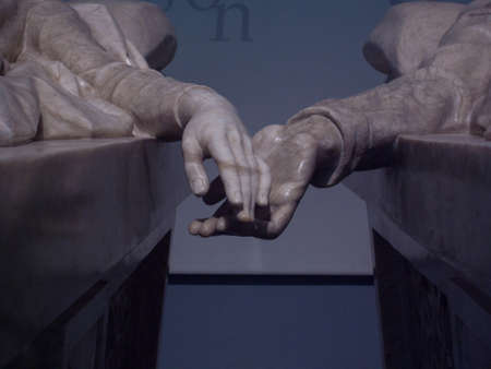 2 marble hands touch themの写真素材