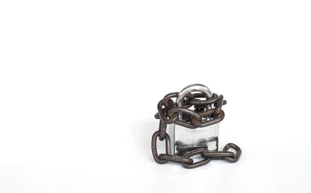 Old lock and old chain on white background.(Soft focus.)の写真素材