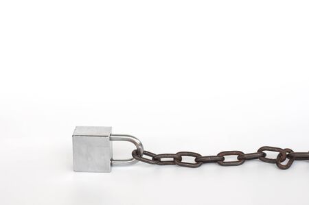 Old lock and old chain on white background.(Soft focus.)の写真素材