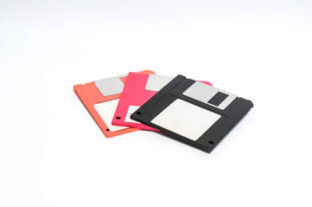 Old floppy disk put on white background,soft focus.の写真素材