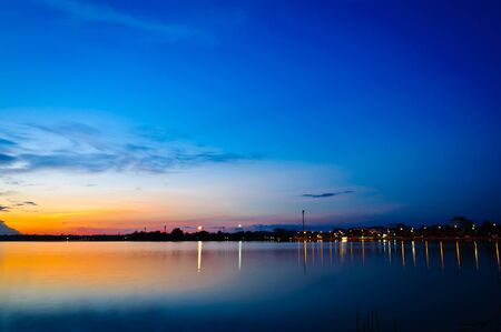 View of sun rise at near lake.の写真素材