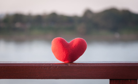 Red heart on wooden,selective focus.の写真素材