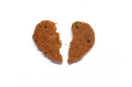 Heart shape cookie and crumb for valentine day,white background.の写真素材
