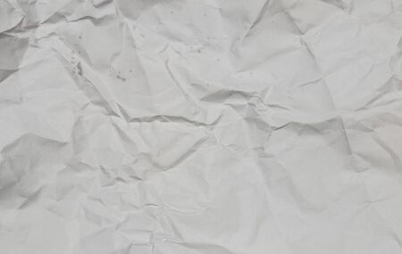 Crumpled white paper texture background.の写真素材