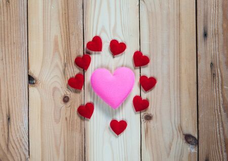 Heart on wooden background,selective focus.の写真素材